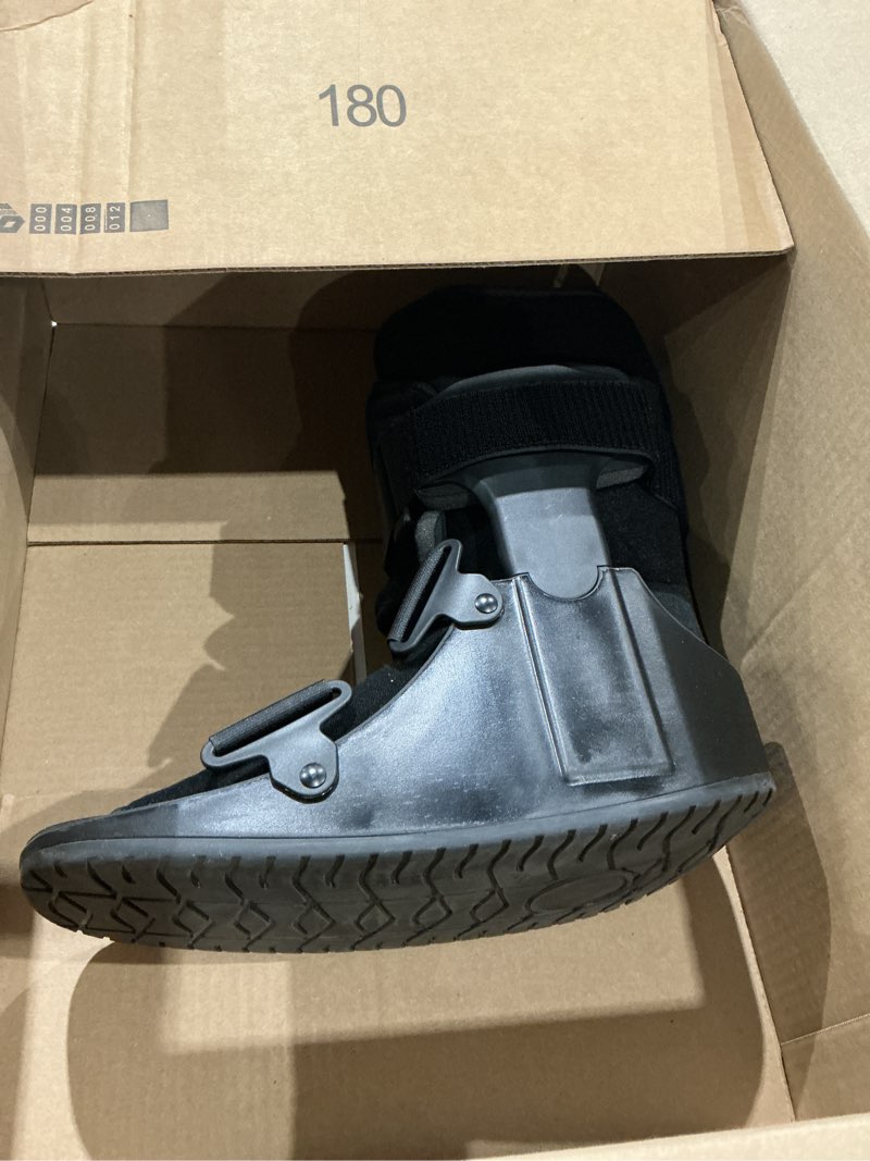 Condition photo showing Good Condition for united ortho short air cam walker fracture boot, large, black black large boot