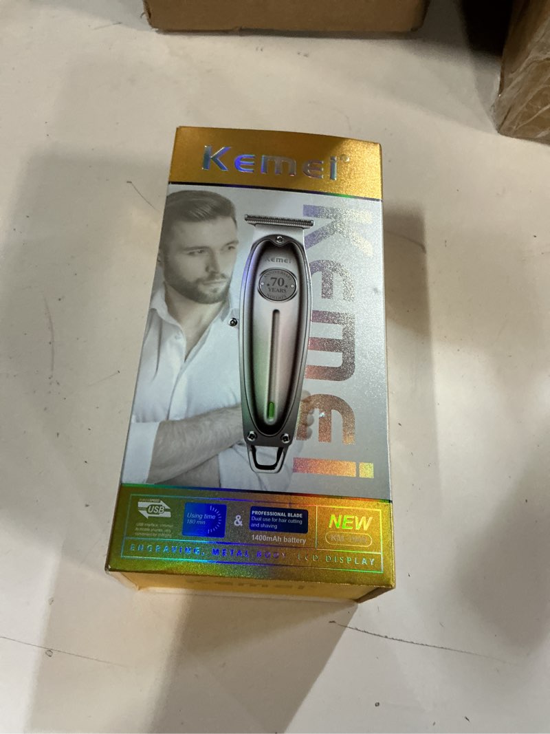 Condition photo showing New/Like New for KEMEI Professional Beard and Hair Trimmer for Men, Cordless T-Blade Trimmers, Electric Hair Clippers for Barbers and Stylists, All Body Grooming Model 1949 Km-19499-silvery