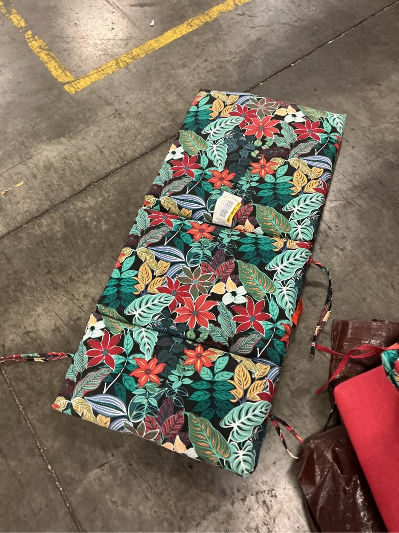 Condition photo showing Good Condition for 20 in. w x 20 in. d high back universal outdoor cushion in black tropical
