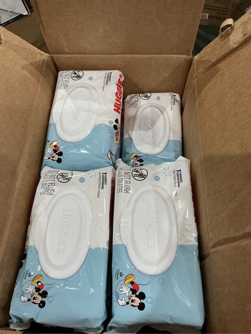 Condition photo showing As Is for huggies simply clean unscented baby diaper wipes, 11 flip-top packs (704 wipes total), packaging may vary 64 count (pack of 11)