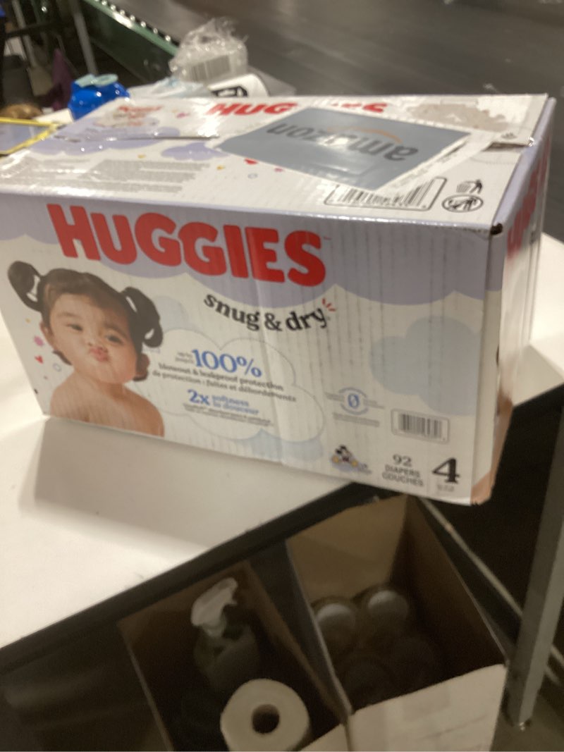 Condition photo showing New/Like New for huggies size 4 diapers, snug & dry baby diapers, size 4 (22-37 lbs), 92 count, packaging may vary size 4 92