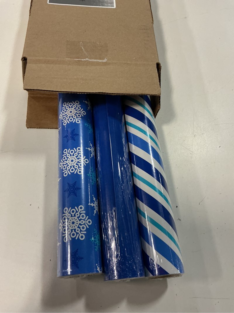 Condition photo showing New/Like New for hallmark holiday wrapping paper with optional diy bow templates on reverse (3 rolls: 120 sq. ft. ttl) blue & white snowflakes, stripes, solid blue for christmas, hanukkah, weddings, birthdays,tri-pack blue diy