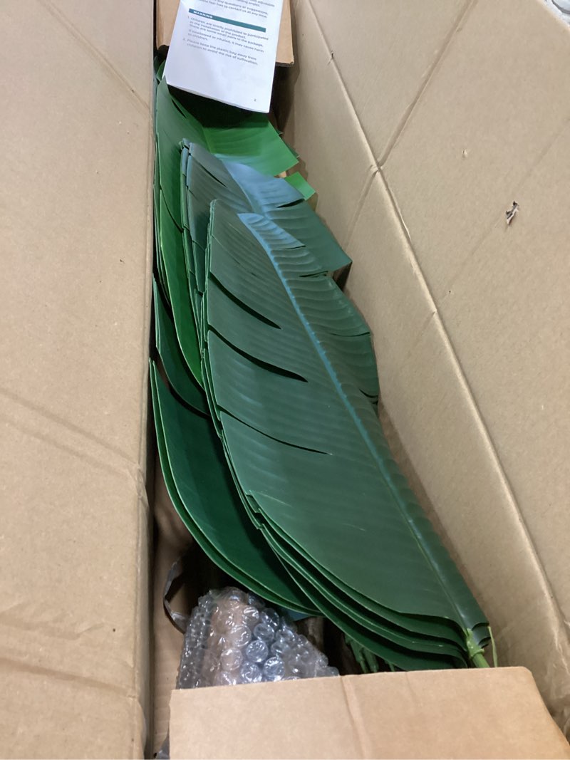 Condition photo showing As Is for artificial bird of paradise plant 7 ft fake banana leaf plant faux tree decor large fake plants realistic indoor outdoor tall floor plant for living room, office decor