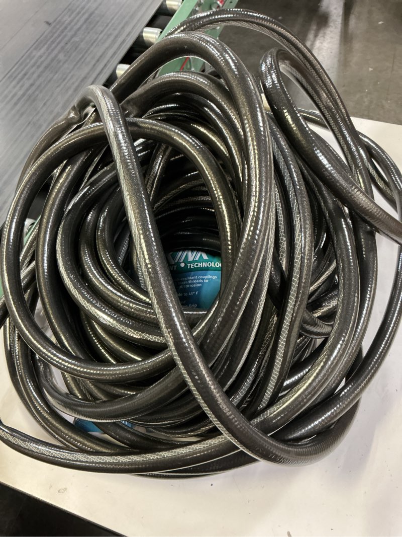 Condition photo showing As Is for neverkink teknor apex 5/8-in x 100-ft heavy-duty kink free vinyl gray coiled hose