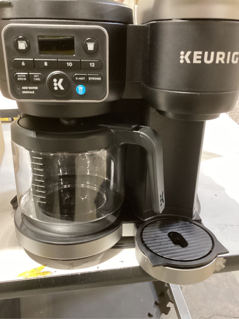 Condition photo showing Good Condition for k-duo essentials coffee maker for hot and iced drinks, single serve kcup pod brewer and 12 cup carafe drip coffee pot, 72 oz water reservoir,pause & pour feature, perfect for home & office use black