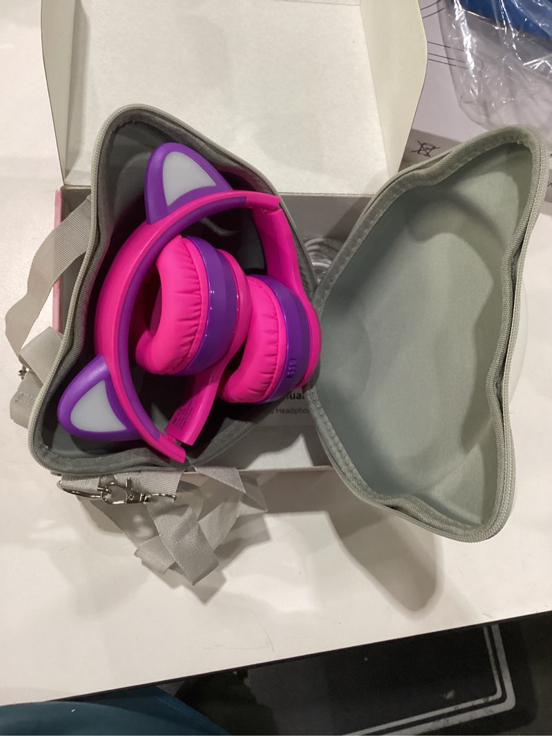 Condition photo showing As Is for missing cord ifecco wireless kids headphones with microphone,foldable cute light up cat ear children girls bluetooth headphones with case for school gifts travel rose purple