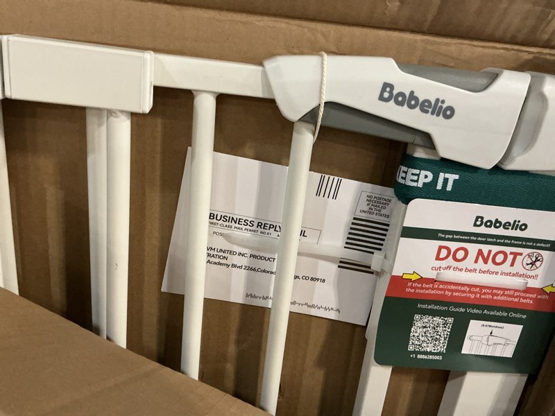 Condition photo showing As Is for BABELIO 36" Tall Dog Gate PressGuard C5, 26-40" Wide Auto Close Baby Gate, Pressure Mounted Metal Pet Gate, Easy Install No Drilling, No Tools Needed, with Wall Protectors and Extension Kits, White White 36"Tall 26"-40" Wide