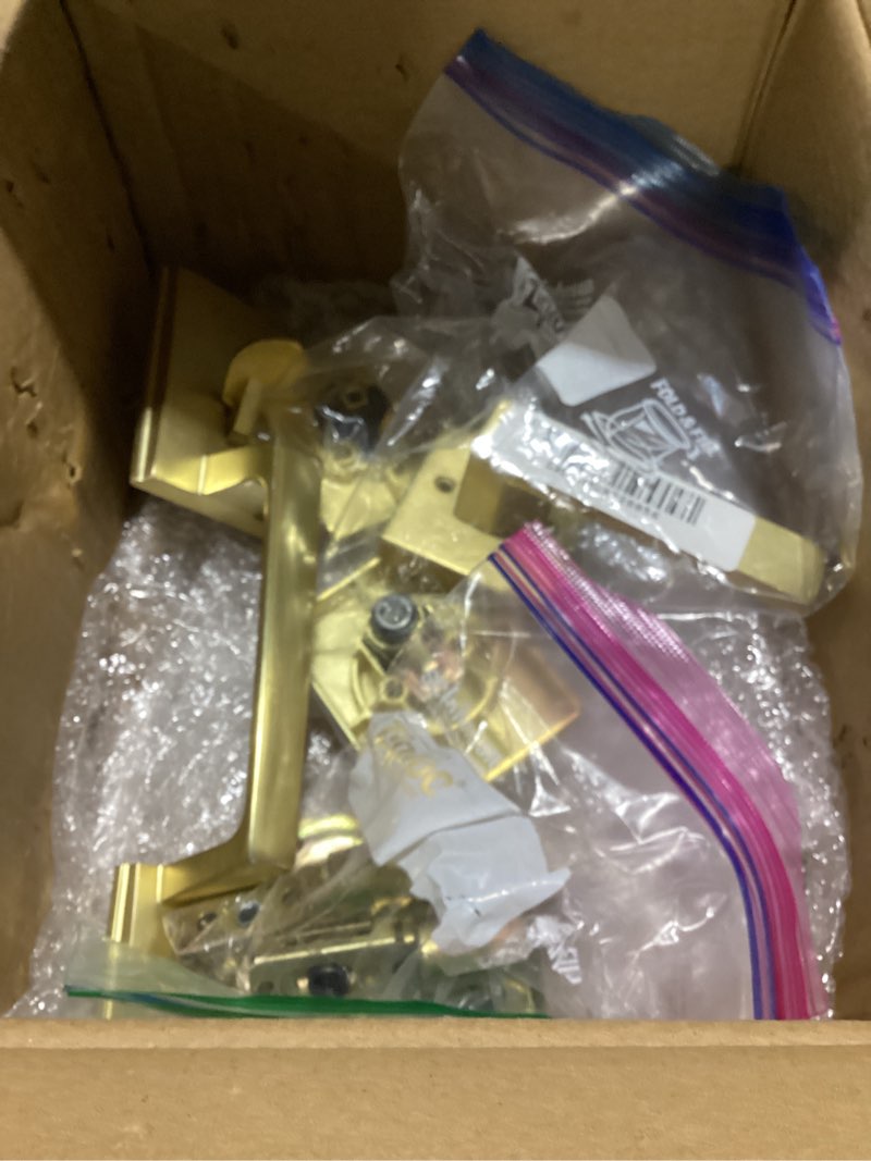 Condition photo showing As Is for Kwikset San Clemente Front Door Lock Handle and Deadbolt Set, Entry Handleset Exterior with Interior Reversible Lever, Satin Brass, Pick Resistant SmartKey Deadbolt Security, with Microban Protection Satin Brass With Handle Keyed Entry