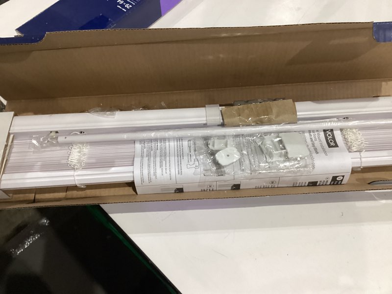 levolor vinyl blind, white. precut to 23" x 64". includes hardware . 