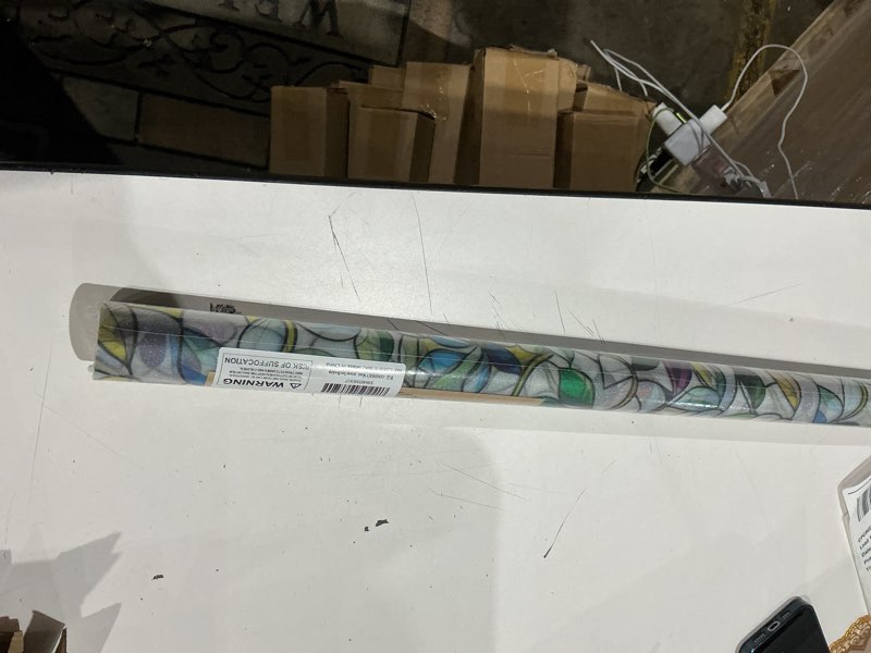 Condition photo showing Good Condition for window film, frosted privacy, one way tint, uv block, heat insulation, anti-glare, static cling, renter friendly for home bathroom door frosted purple flower 23.5*78.5