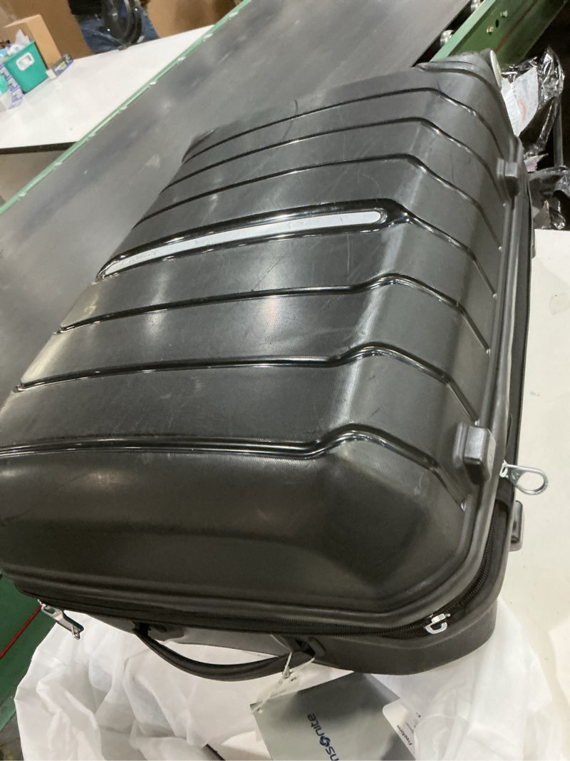 Condition photo showing As Is for samsonite freeform 24-inch medium luggage with dual 360° spinner wheels - checked suitcase - tsa lock, airline-approved - durable polypropylene expandable hardshell for lightweight travel - black checked-medium spinner black