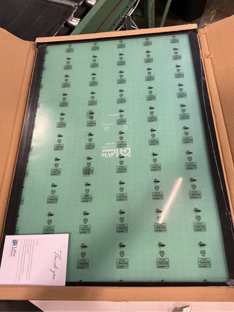 Condition photo showing New/Like New for lavie home 22.375x34 picture frame black puzzle frame, display pictures, puzzle 22.375x34 without mat, stable frame and polished plexiglass, horizontal and vertical format of the walls 22.375x34 black