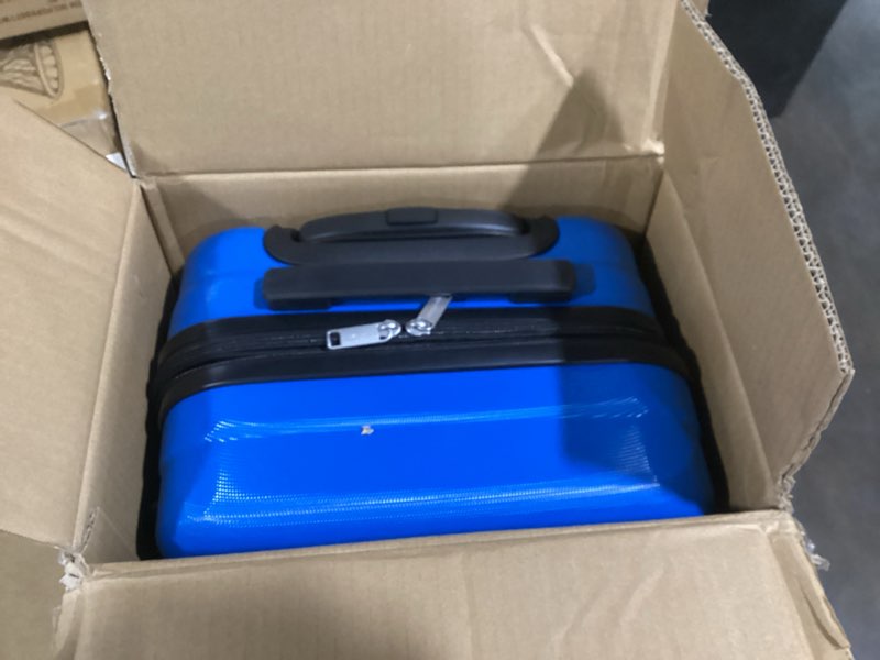 Condition photo showing Good Condition for Amazon Basics 21" Hardside Carry-On Luggage, Hardshell Suitcase With Wheels, Expandable For Up to 25% More Space, With Scratch-Resistant Surface, Four Multi-directional Wheels, Light Blue Light Blue Carry-On