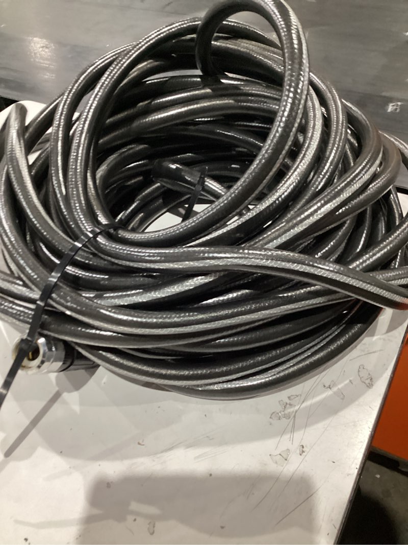 NeverKink Teknor Apex 5/8-in x 100-ft Heavy -Duty Kink Free Vinyl Gray Coiled Hose