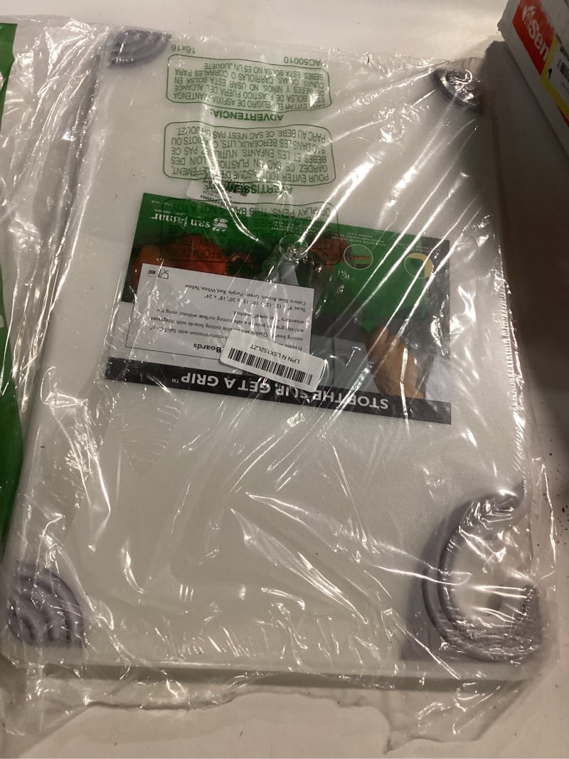 Condition photo showing New/Like New for San Jamar Saf-T-Grip Plastic Cutting Board with Safety Hook, 12" x 18" x 0.5", White White 1