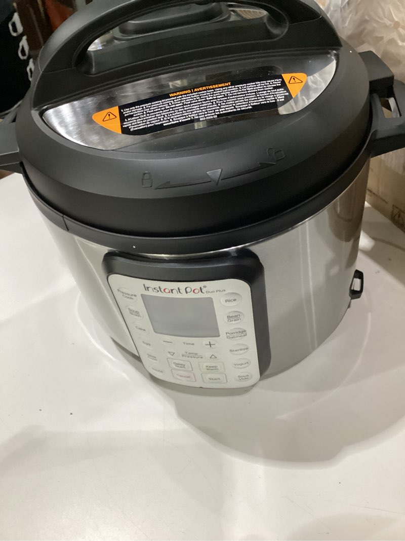 Condition photo showing As Is for instant pot duo plus 9-in-1 multicooker, pressure cooker, slow cook, rice maker, steamer, sauté, yogurt, warmer & sterilizer, includes app with over 800 recipes, stainless steel, 6 quarts, not tested