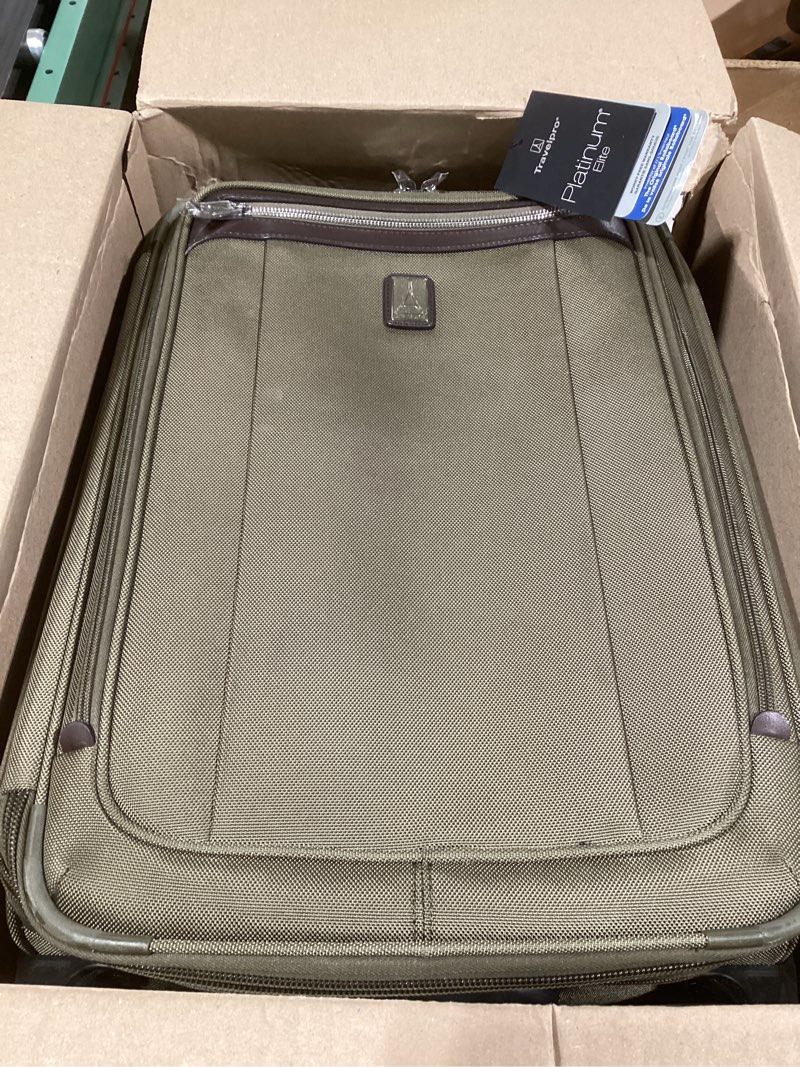 Condition photo showing Good Condition for Very similar to…..Travelpro Platinum Elite Softside Expandable Carry on Luggage, 2 Wheel Upright Suitcase, USB Port, Men and Women, Pilot Green, Carry On 22-Inch Pilot Green Carry On 22-Inch. (Same brand different model) (see pictures)