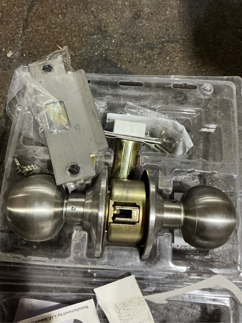 Condition photo showing As Is for possibly used commercial steel ball entrance lockset keyed entry door knob