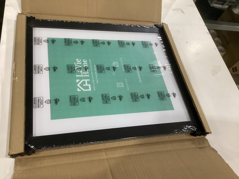Condition photo showing Good Condition for lavie home 14 x 17 poster frame black, display pictures 11x14 with mat or 14x17 without mat, stable and sturdy picture frame and polished plexiglass, horizontal and vertical format of the wall?1 pack? 14x17 black