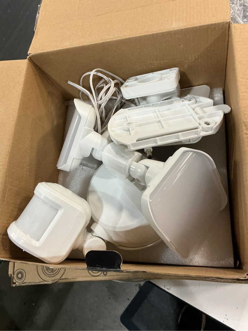 Condition photo showing As Is for GLOBE Electric 17000221 19W LED Integrated Solar Powered Motion Activated Flood Light, 180-Degree Motion Detection, White Finish, 1100 Lumens, Solar Panel with 10ft Cord, Outdoor Lights White, 1100 Lumen