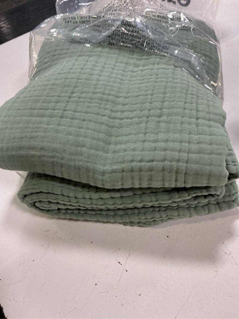 Condition photo showing Good Condition for bedsure 100% cotton muslin throw blanket large 50x70 inches - 4-layer breathable and lightweight thin soft summer gauze muslin blankets for adults, sage green, boho cotton throw for couch 00 - sage green throw xl (50" x 70")