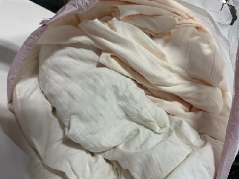 Condition photo showing As Is for CozyLux Queen Comforter Set Ivory Seersucker 7 Pieces Bed in a Bag Queen Comforter Set with Sheets, Luxury Soft Bedding Set with Down Alternative Comforter, Sheets, Pillowcases & Shams for All Seasons Ivory Queen