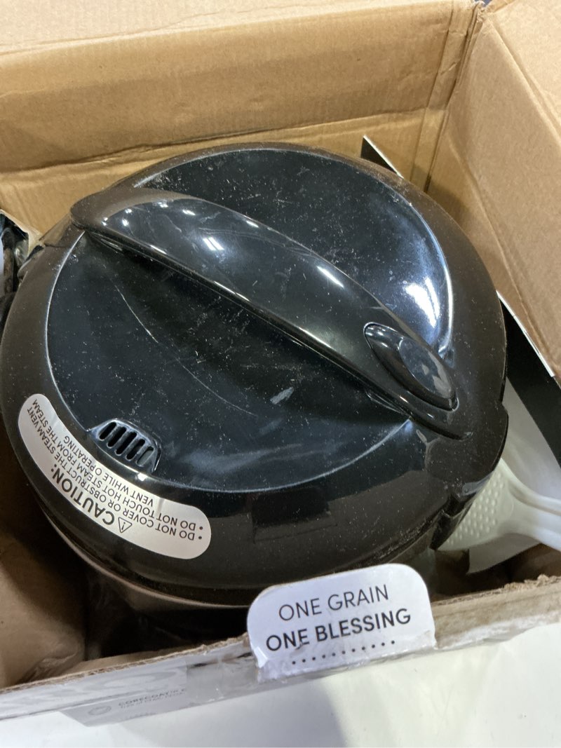 Condition photo showing As Is for AROMA Digital Rice Cooker, 4-Cup (Uncooked) / 8-Cup (Cooked), Steamer, Grain Cooker, Multicooker, 2 Qt, Stainless Steel Exterior, ARC-914SBD 4 Cup Uncooked / 8 Cup Cooked