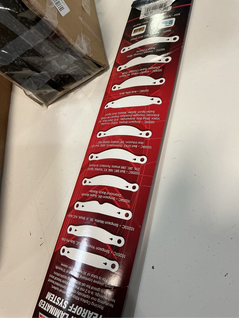 Condition photo showing Good Condition for racing optics 10205c - racing optics xstack helmet tear off fits bell: gtx, vortex, br-1, m4, k-1, sport, 267 shield, 281 shield, 288 shield; all pyrotect helmets and racequip pro15