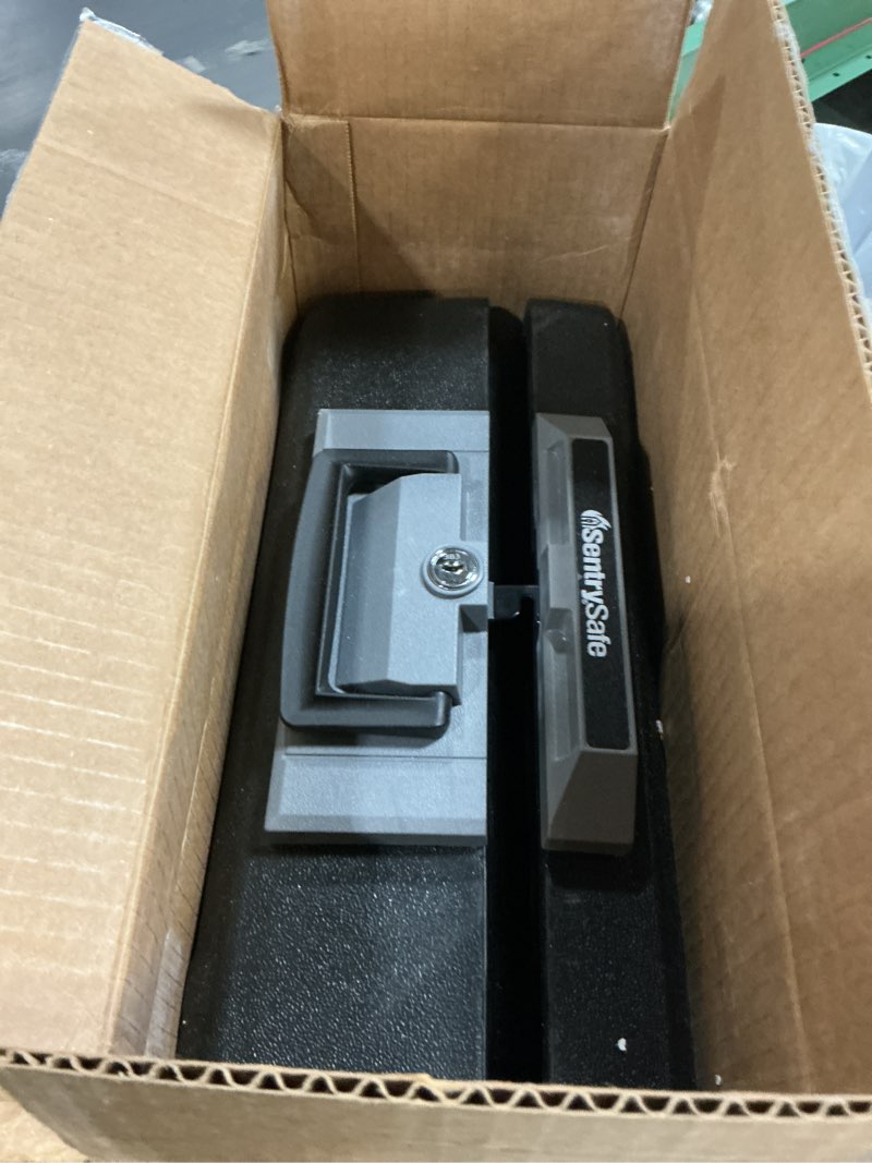 Condition photo showing As Is for SentrySafe Fireproof Safe Box with Key Lock, Chest Safe with Carrying Handle to Secure Money, Jewelry, Documents, 0.25 Cubic Feet, 6.3 x 15.3 x 12.1 Inches, 1160 Fire resistant box 0.25 cu. ft.