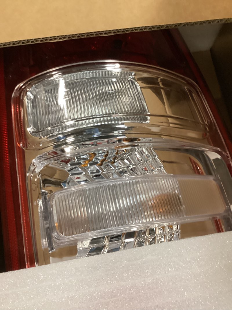 Condition photo showing Good Condition for tail light chrome bezel compatible with 2019-2023 dodge ram 1500 right passenger side taillight replace 55112988ae chrome bezel right