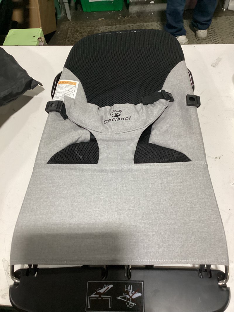 Condition photo showing New/Like New for comfybumpy ergonomic baby bouncer seat - bonus travel carry case - safe, portable bouncing chair with adjustable height positions - infant bouncy seat perfect for newborn babies (grey)