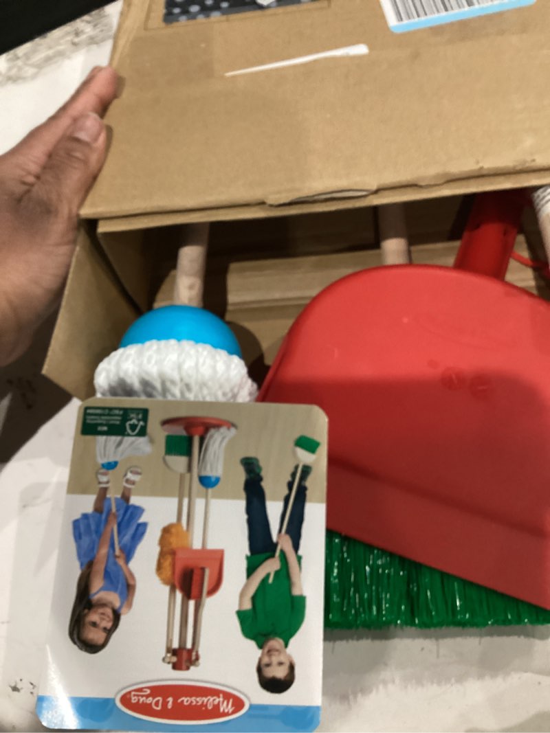 Condition photo showing As Is for Melissa & Doug Dust Sweep Mop 6-Piece Pretend Play Set, Toddler Toy Cleaning, Pretend Play Home Cleaning, Kids Broom and Mop Set for Ages 3+