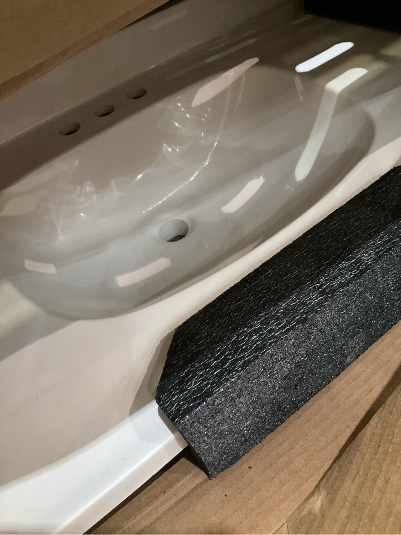 Condition photo showing As Is for project source cultured marble vanity tops 31-in x 22-in white cultured marble integral single sink 3-hole bathroom vanity top