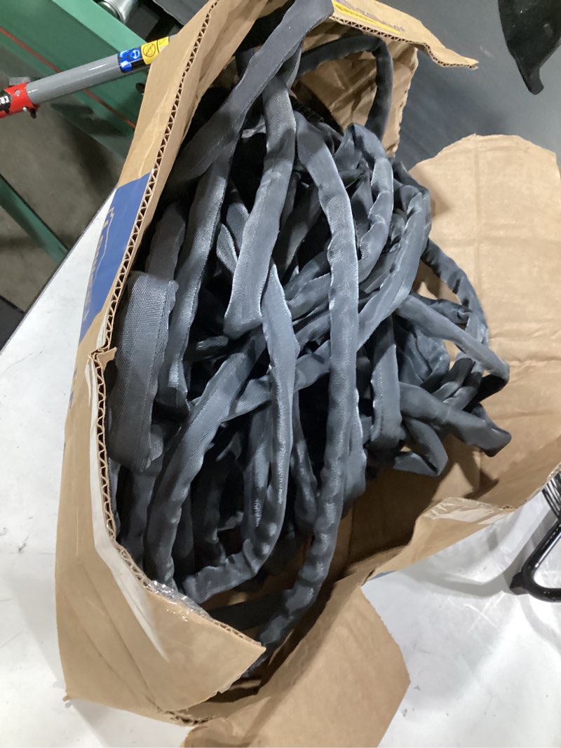 Condition photo showing As Is for black garden hose