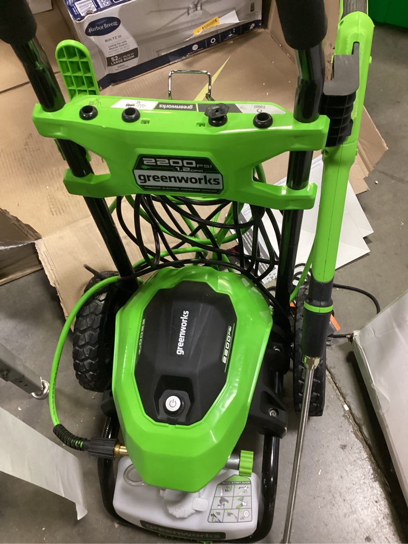 Condition photo showing As Is for greenworks 2200-psi 1.2-gpm cold water electric pressure washer with 4 spray tips