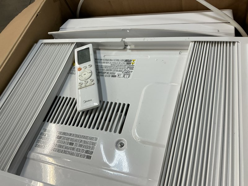 Condition photo showing As Is for LG 7,600 BTU Window Air Conditioner with Heat, 115V, Cools 330 Sq.Ft. for Bedroom, Living Room, Apartment, with Remote, 2 Speeds, Slide In-Out Chassis, 24-hour Timer, White
