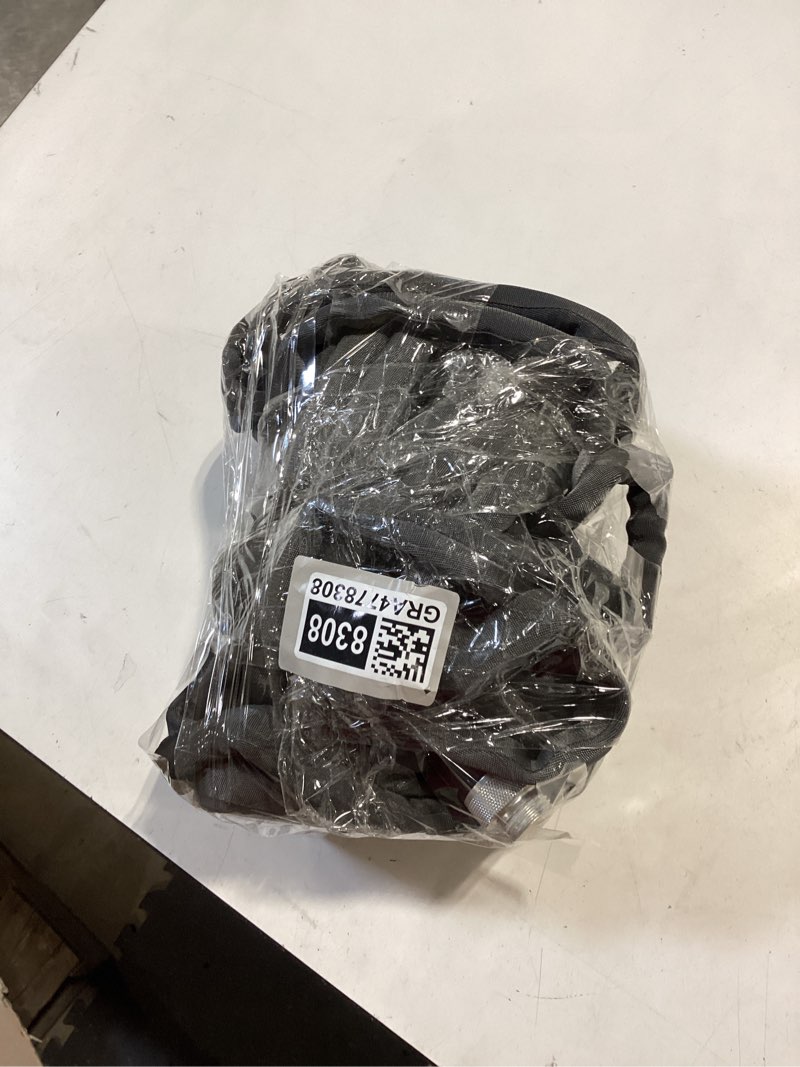 Condition photo showing As Is for zero-g teknor apex 5/8-in x 50-ft premium -duty kink free woven gray hose