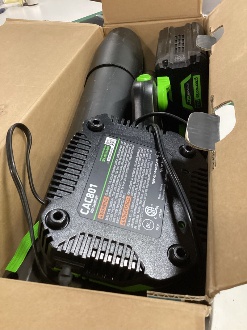 Condition photo showing As Is for greenworks 60v (610 cfm / 130 mph) cordless leaf blower, high power, lightweight & quiet operation for wet leaves, driveways and dense gravel, includes 2.5ah battery & 5a rapid charger blower (610 cfm), 2.5ah