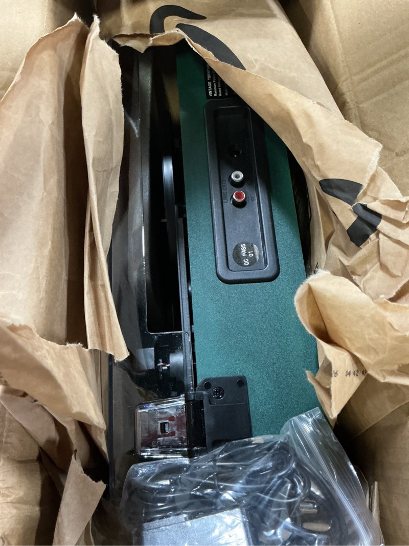 Condition photo showing As Is for bluetooth record player, vintage turntable with treble & bass control, built-in stereo speakers, 3-speed belt-drive (33/45/78 rpm), auto stop, rca/aux/headphone jack, green