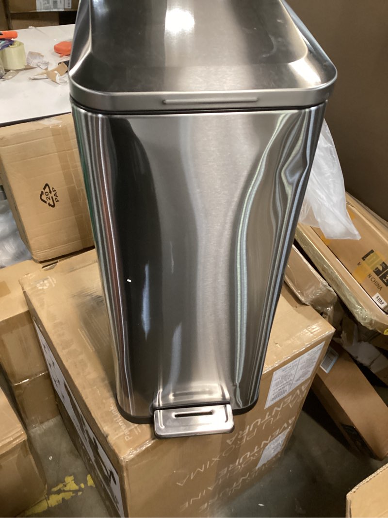 Condition photo showing As Is for Garvee 13 gal / 50 L Stainless Steel Kitchen Trash Can with Lid, Slim Rustproof Garbage Can, Large Step-on Metal Trash Bin with Inner Bucket, Rear Handle, Soft Close Lid, Silver Silver 13.2 Gallons (similar product)
