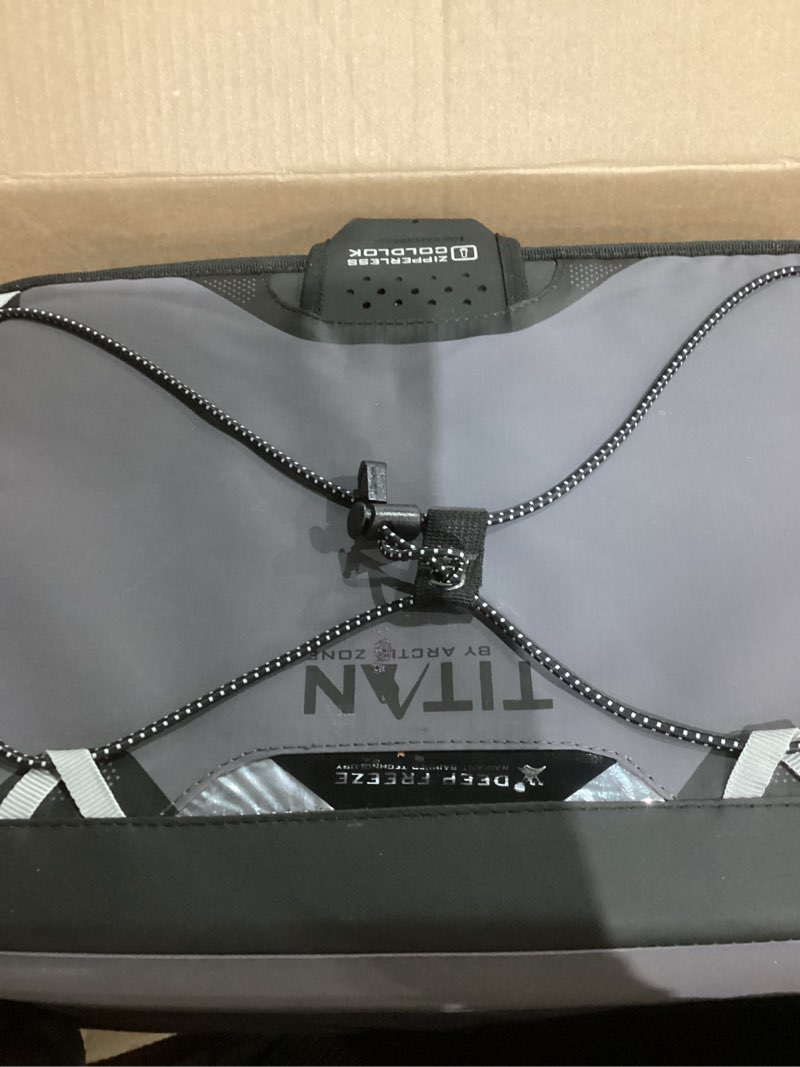 Condition photo showing As Is for Titan by Arctic Zone Deep Freeze Cooler - Zipperless Hardbody Cooler - Deep Freeze Insulation, HardBody Liner, and SmartShelf 30 Can Sharkskin Gray