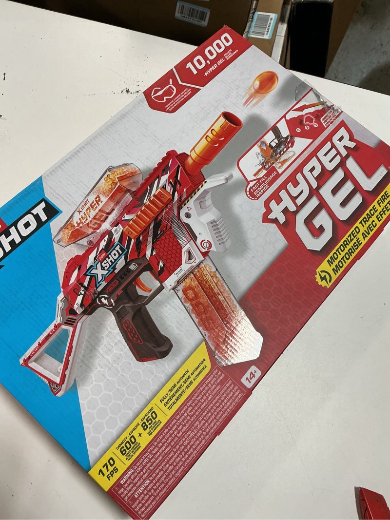 Condition photo showing New/Like New for XSHOT Hyper Gel Trace Fire Blaster, Semi and Fully Automatic Gel Blaster & 10,000 Gellets, 600 Capacity Hopper & 850 Capacity Mag, Ages 14 & Up by ZURU