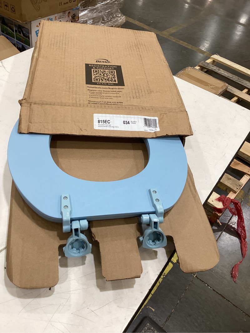 Condition photo showing Good Condition for mayfair padded toilet seat, cushioned soft vinyl over wood core seat, secure hinges, easy clean, made in usa, round, sky blue round sky blue toilet seat