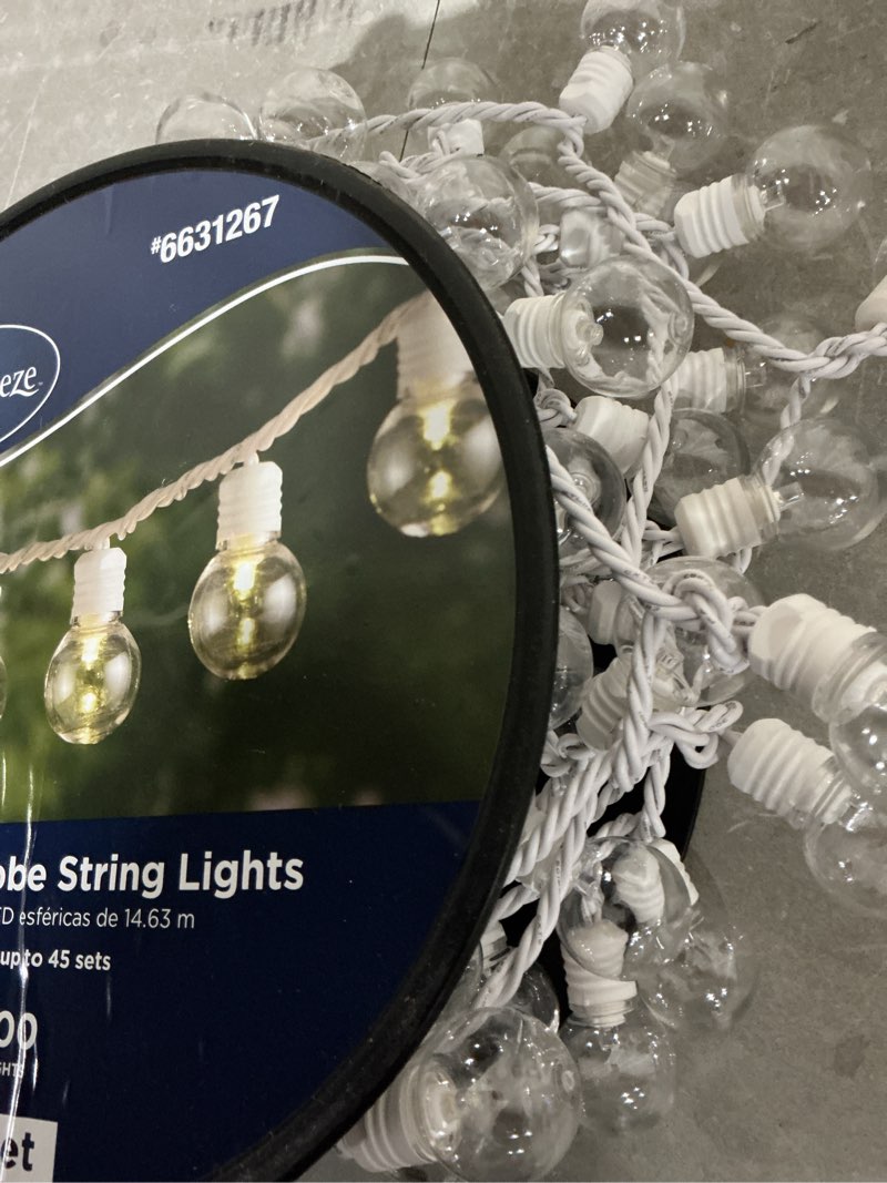 Condition photo showing Good Condition for 1k+ bought last week harbor breeze 48-ft plug-in white indoor/outdoor string light with 100 white -light led globe bulbs