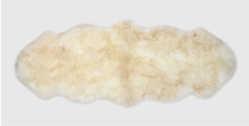 Heitz sheepskin area rug in yellow/cream 2’ x 5’6”