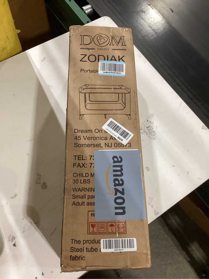 Condition photo showing New/Like New for Dream On Me Zodiak Portable Playard in Cool Gray, Lightweight, Packable and Easy Setup Baby Playard, Breathable Mesh Sides and Soft Fabric - Comes with a Removable Padded Mat