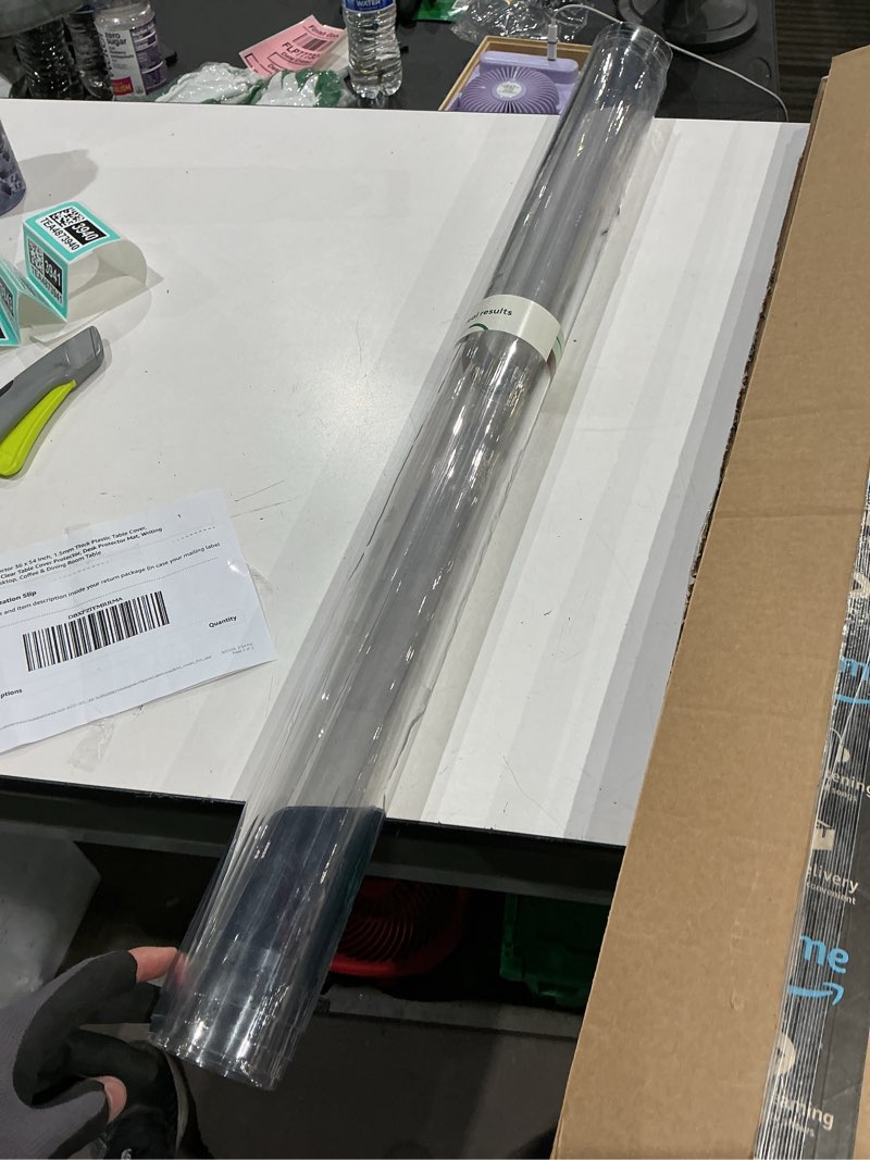 Condition photo showing Good Condition for lovepads clear table cover protector 36 x 54 inch, 1.5mm thick plastic table cover, table protector for dining room table, waterproof vinyl tablecloth table pad mat for kitchen, dresser, writing desk 36" x 54" (rectangular) clear 1.5mm