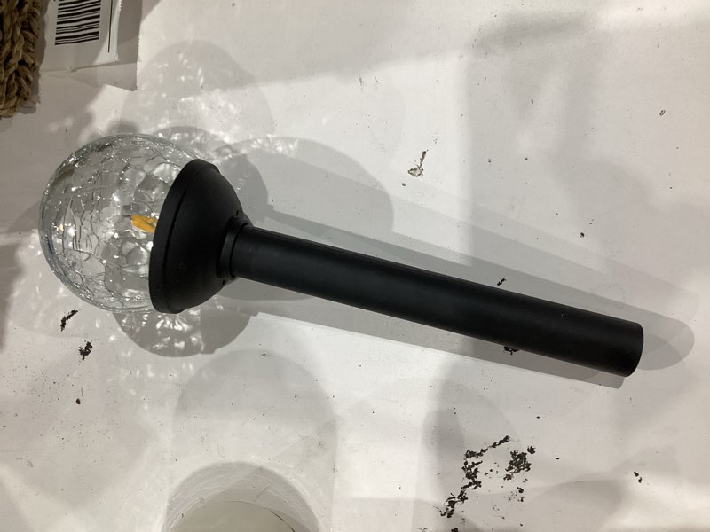 Condition photo showing As Is for harbor breeze -lumens matte black solar led outdoor path light with dusk-to-dawn sensor