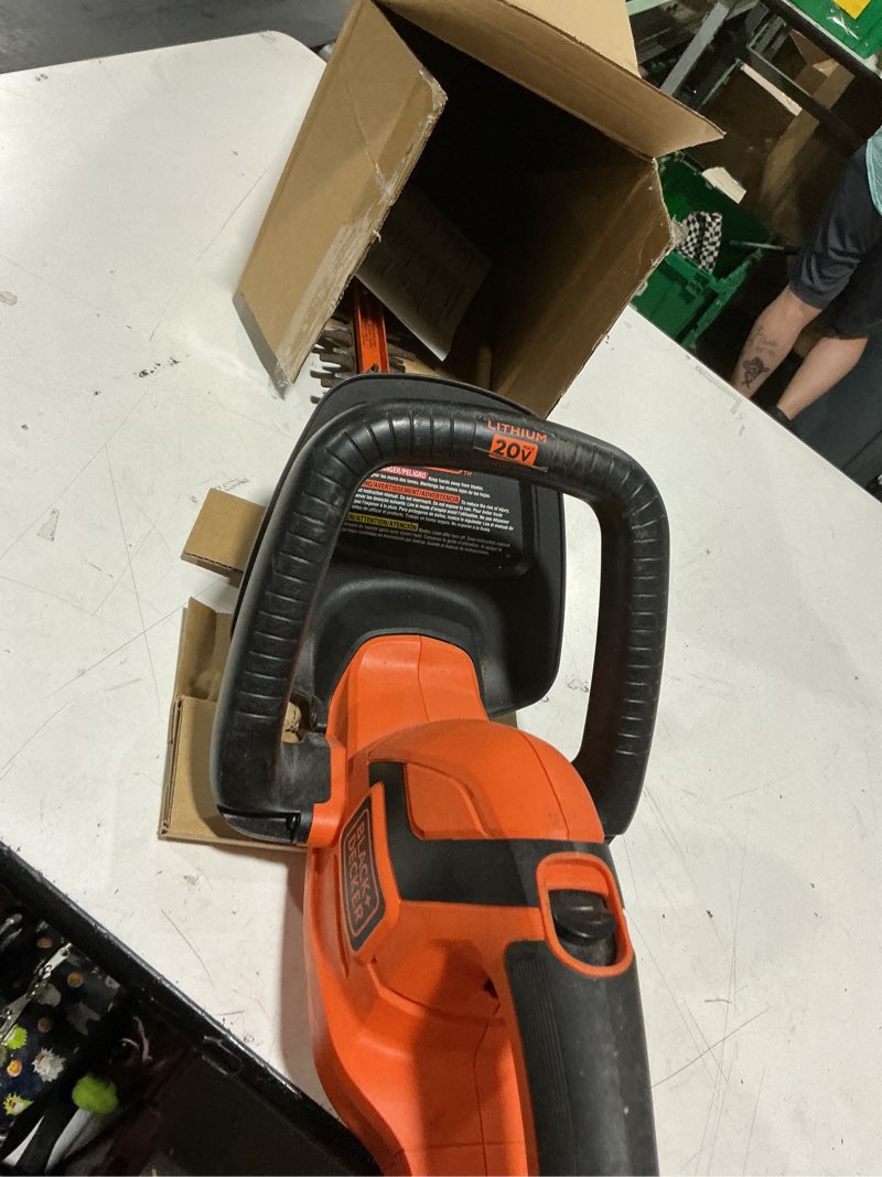 Condition photo showing As Is for black+decker 20v max cordless hedge trimmer, battery and charger included, 22 inch steel blade lightweight bush trimmer, soft grip, less vibration (lht2220)