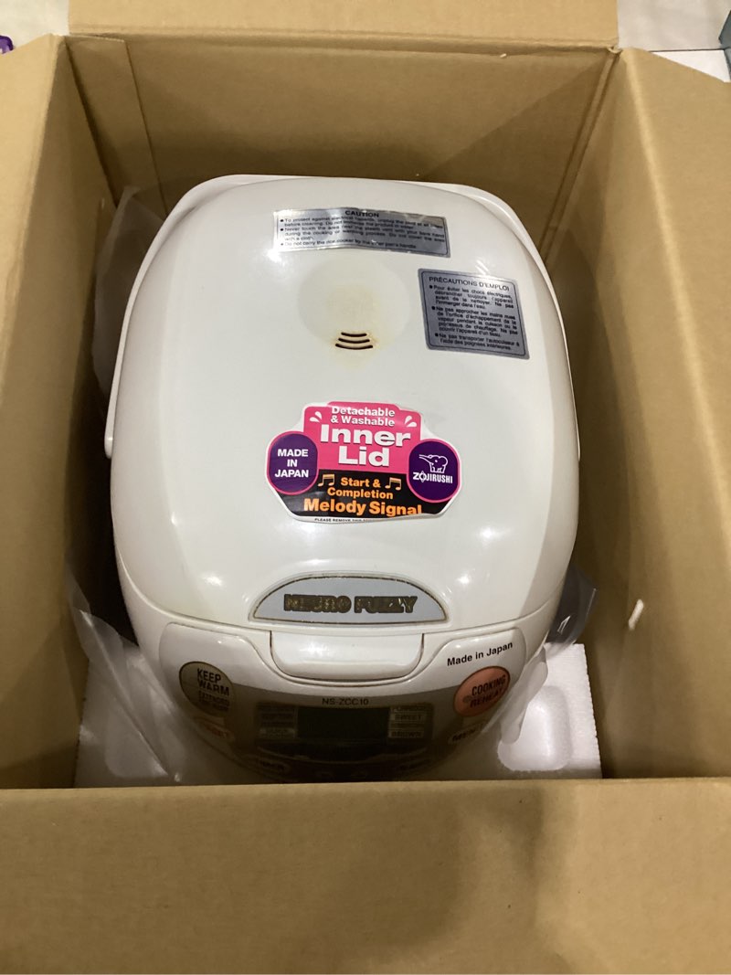 Condition photo showing As Is for zojirushi ns-zcc10 5-1/2-cup neuro fuzzy rice cooker and warmer, premium white 5.5-cup uncooked rice
